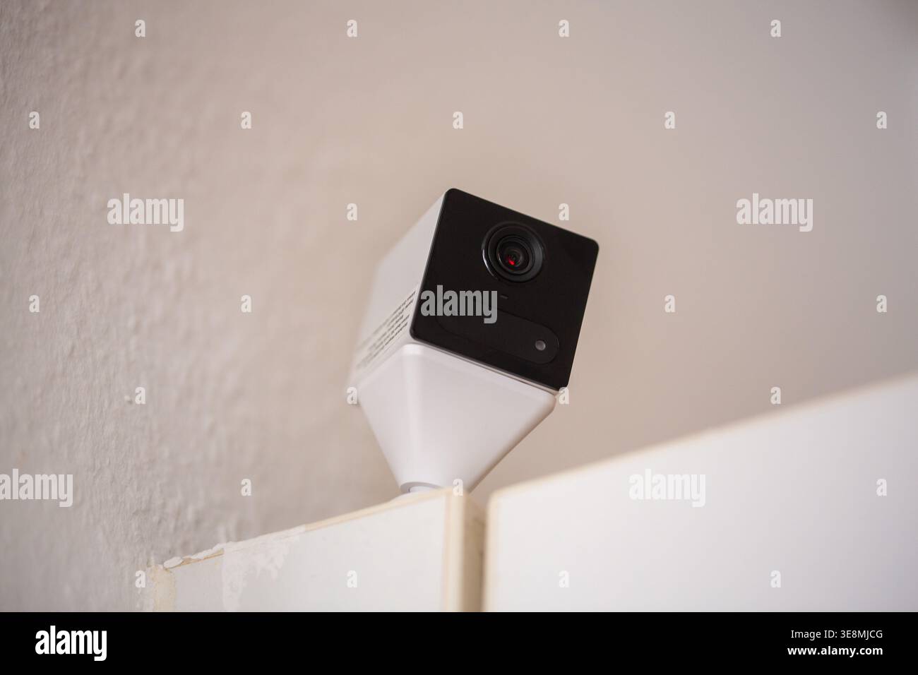 ILLUSTRATION - 14 April 2026, Berlin: A surveillance camera stands on a ...