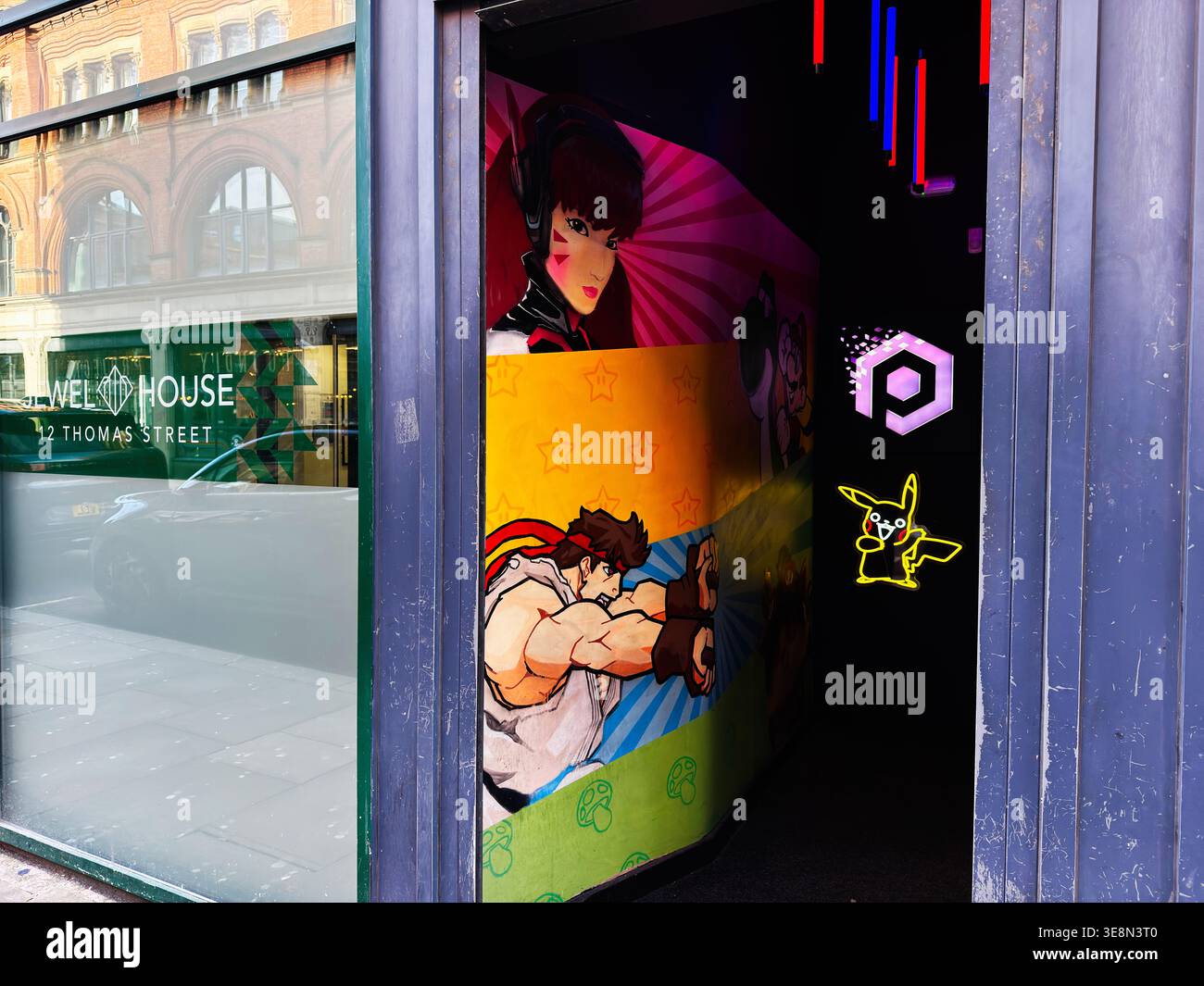 Manchester, UK - February 22, 2026: Vibrant gaming mural and neon ...