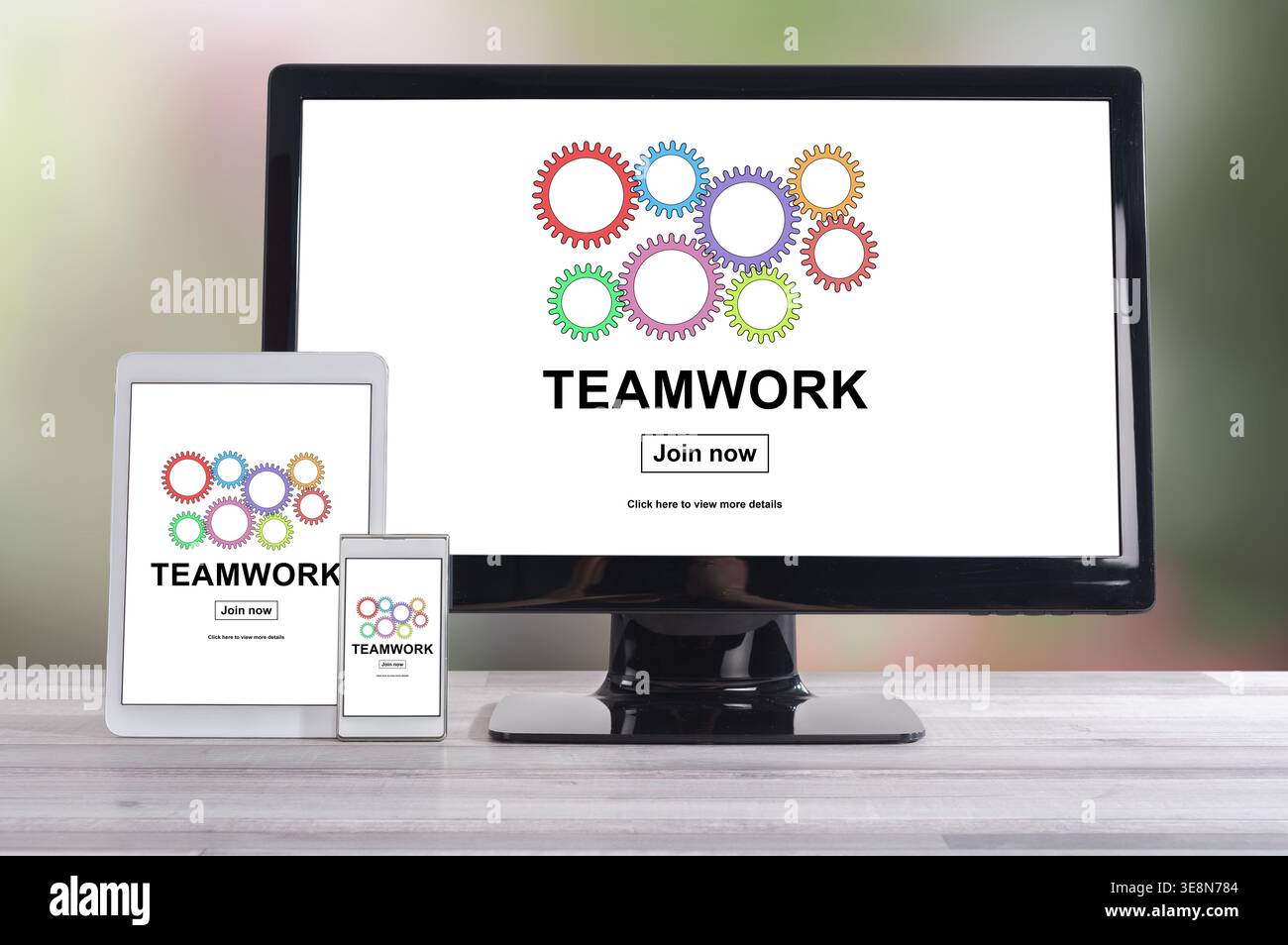 Teamwork concept shown on different information technology devices Stock Photo