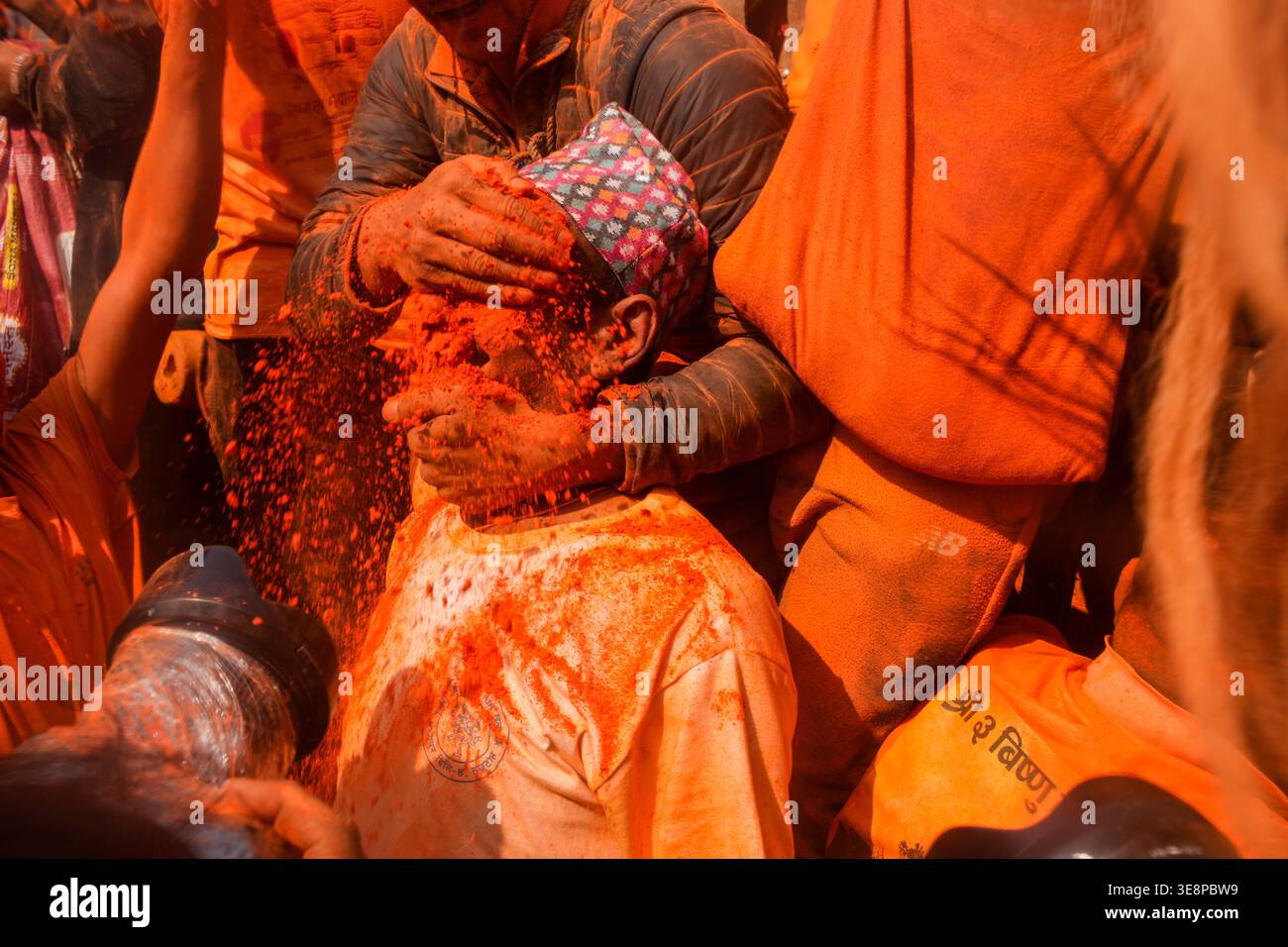 Vermilion Powder A devotee smears his friendís face with vermilion powder during the ...