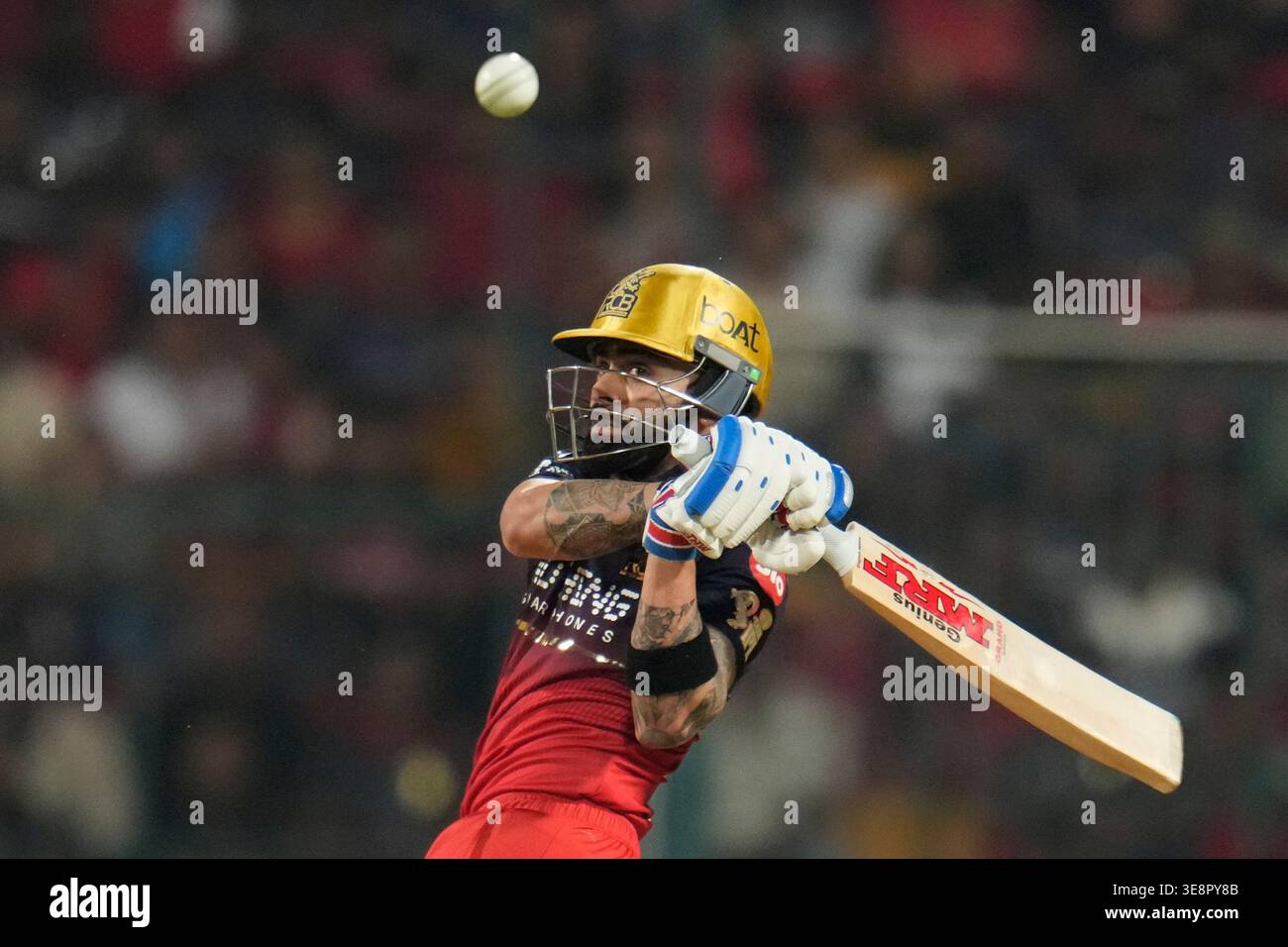 Royal Challengers Bengaluru's Virat Kohli hits a boundary during the ...