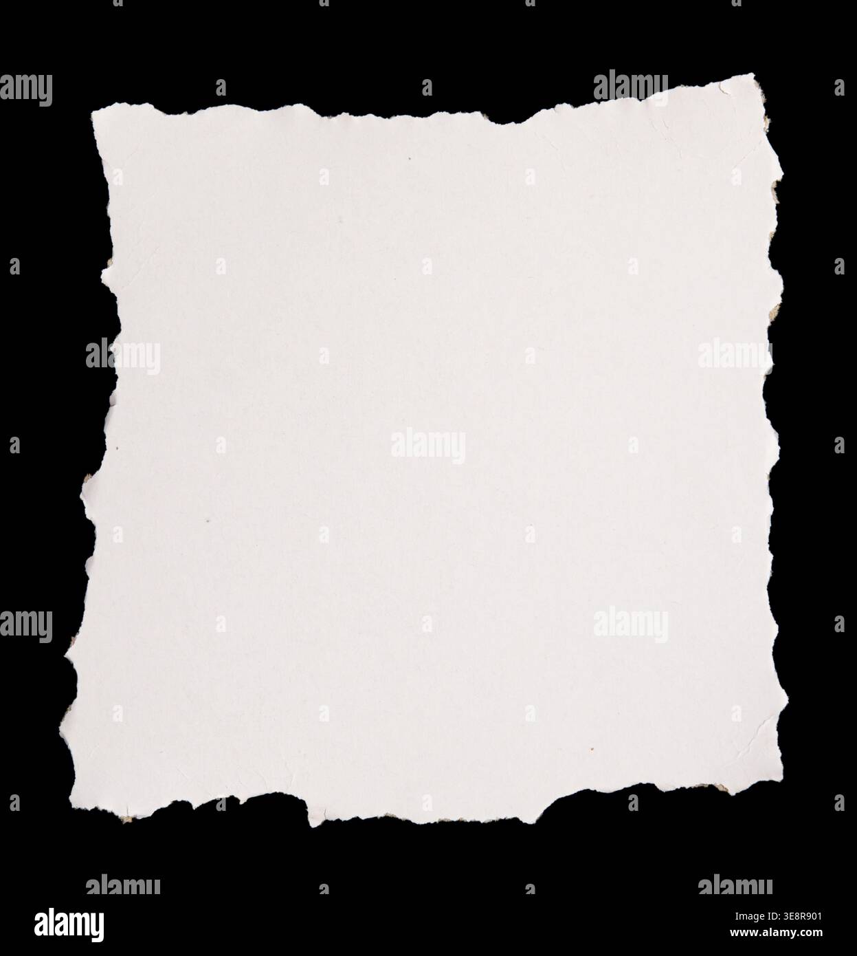 Ripped paper on black background Stock Photo