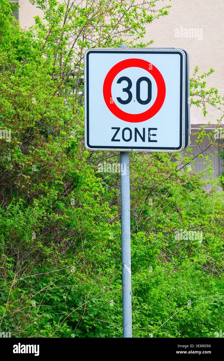 Speed limit 30 zone sign indicating a reduced speed area for safety ...
