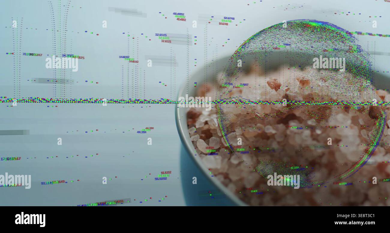 Glitching wide band revealing white-rim bowl magnifying pink rock salt on blue table, copy space Stock Photo