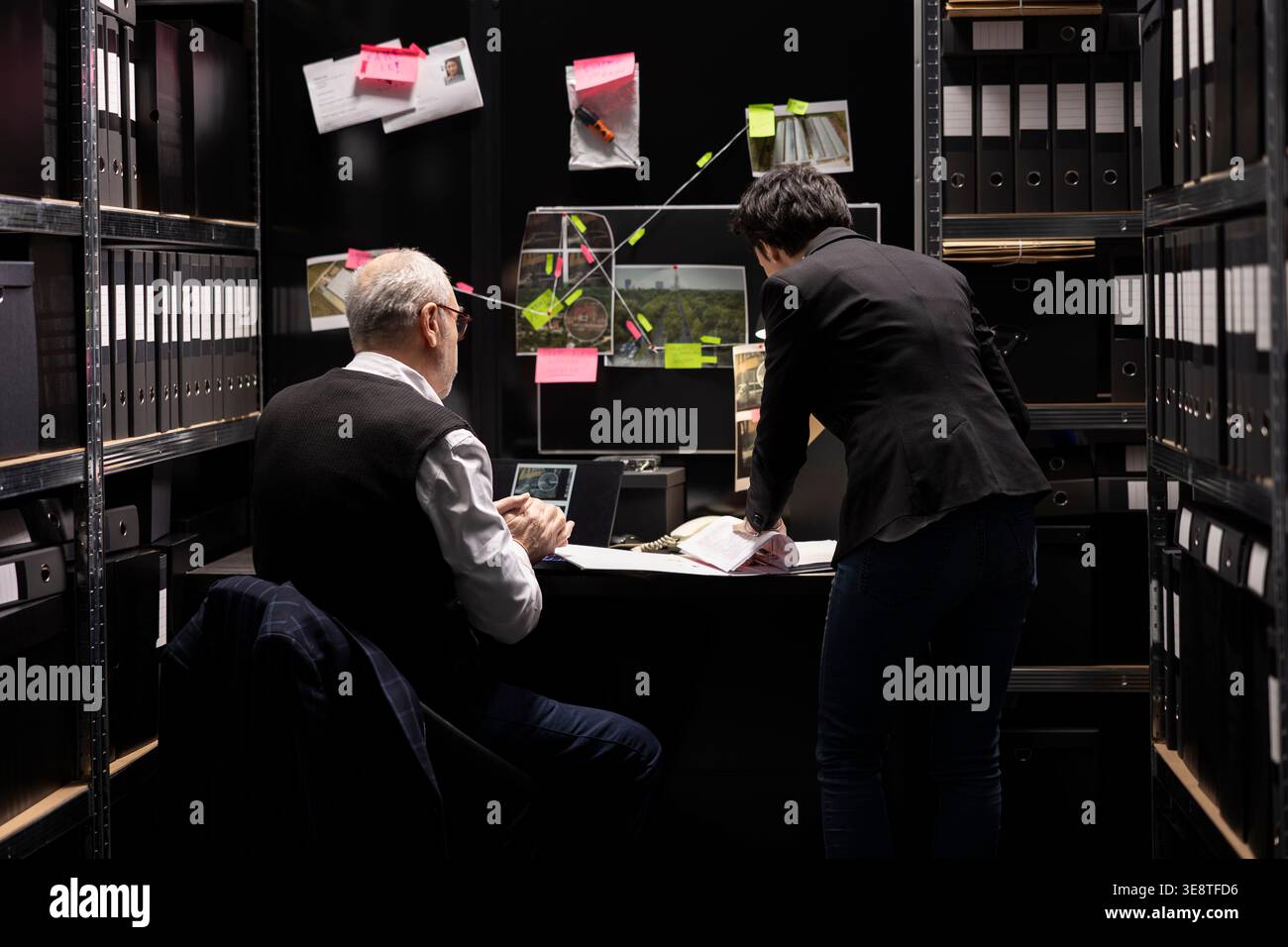 Evidence Classified Team of criminologists interpreting fingerprints and classified ...