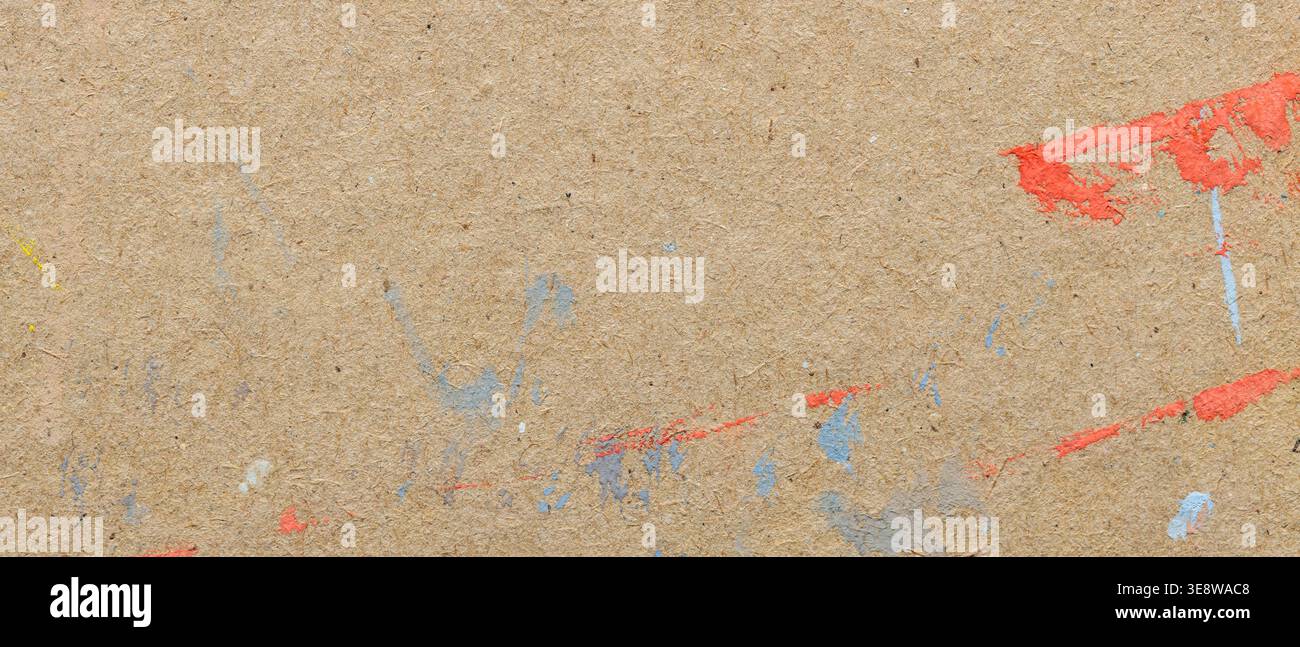 Grunge cardboard paper texture background with colorful paint splash and splatter marks Stock Photo