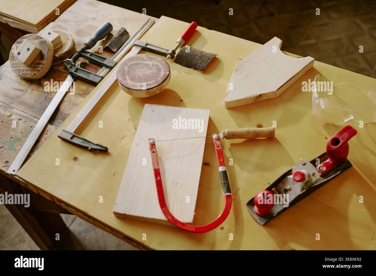 Woodworking Tools Arranged on Workbench for Carpentry Project Stock Photo