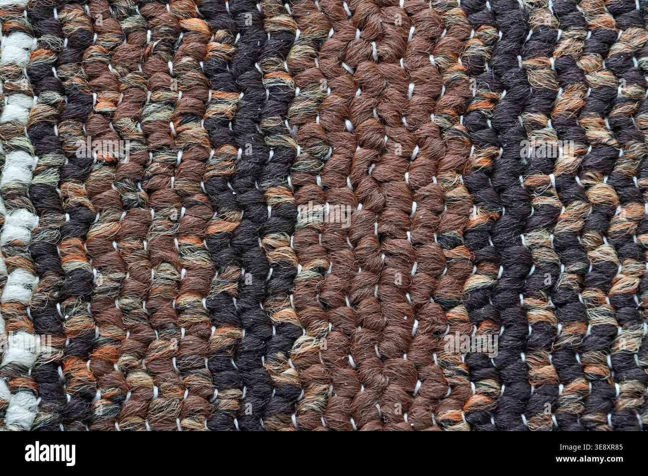 Knitted woolen texture. Knitted woolen background. Close-up. Stock Photo