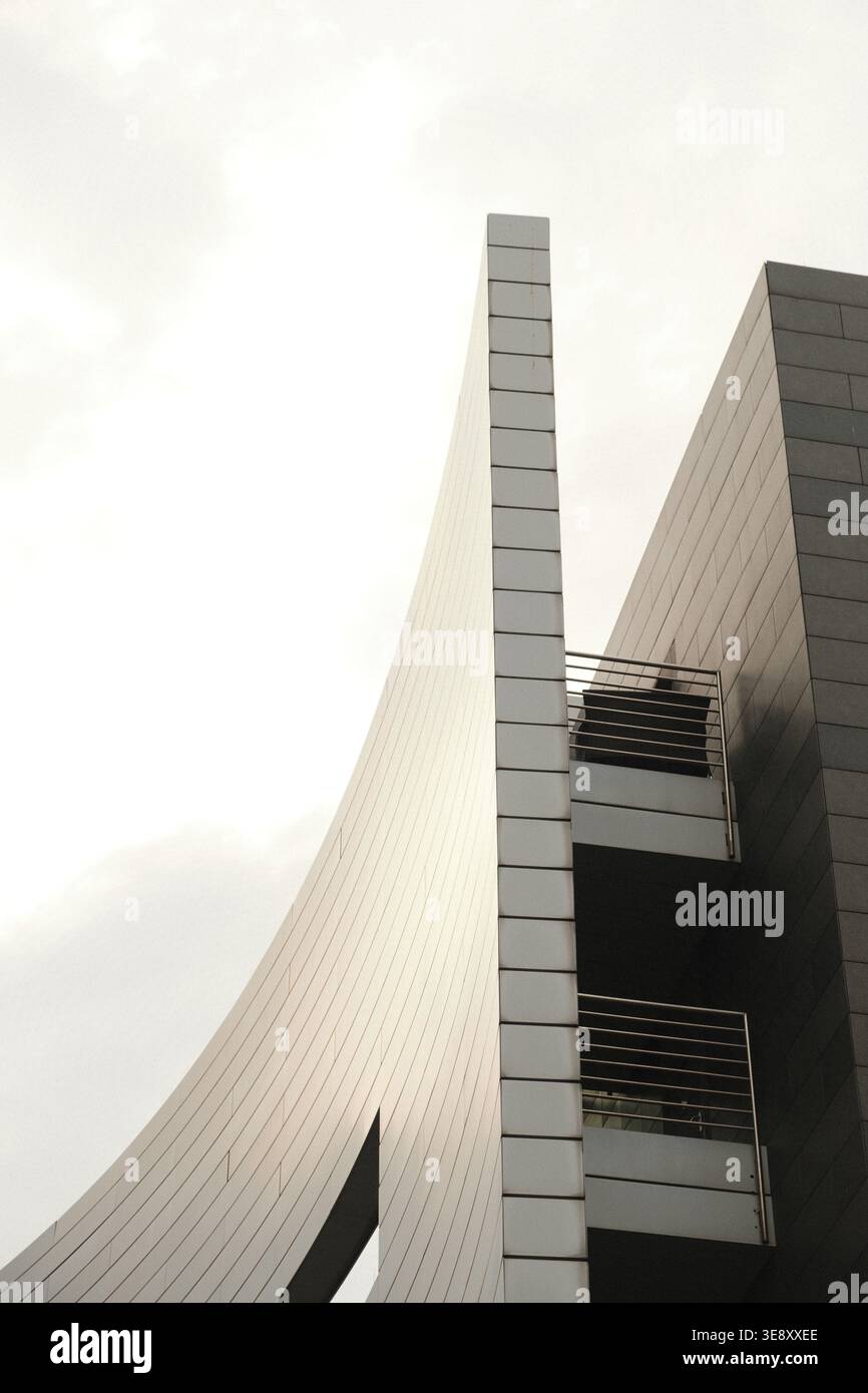 Abstract architectural detail of a modern building in ��ü���������ǰ���'s Media Harbour, featuring sharp white angles against a pale sky. Stock Photo