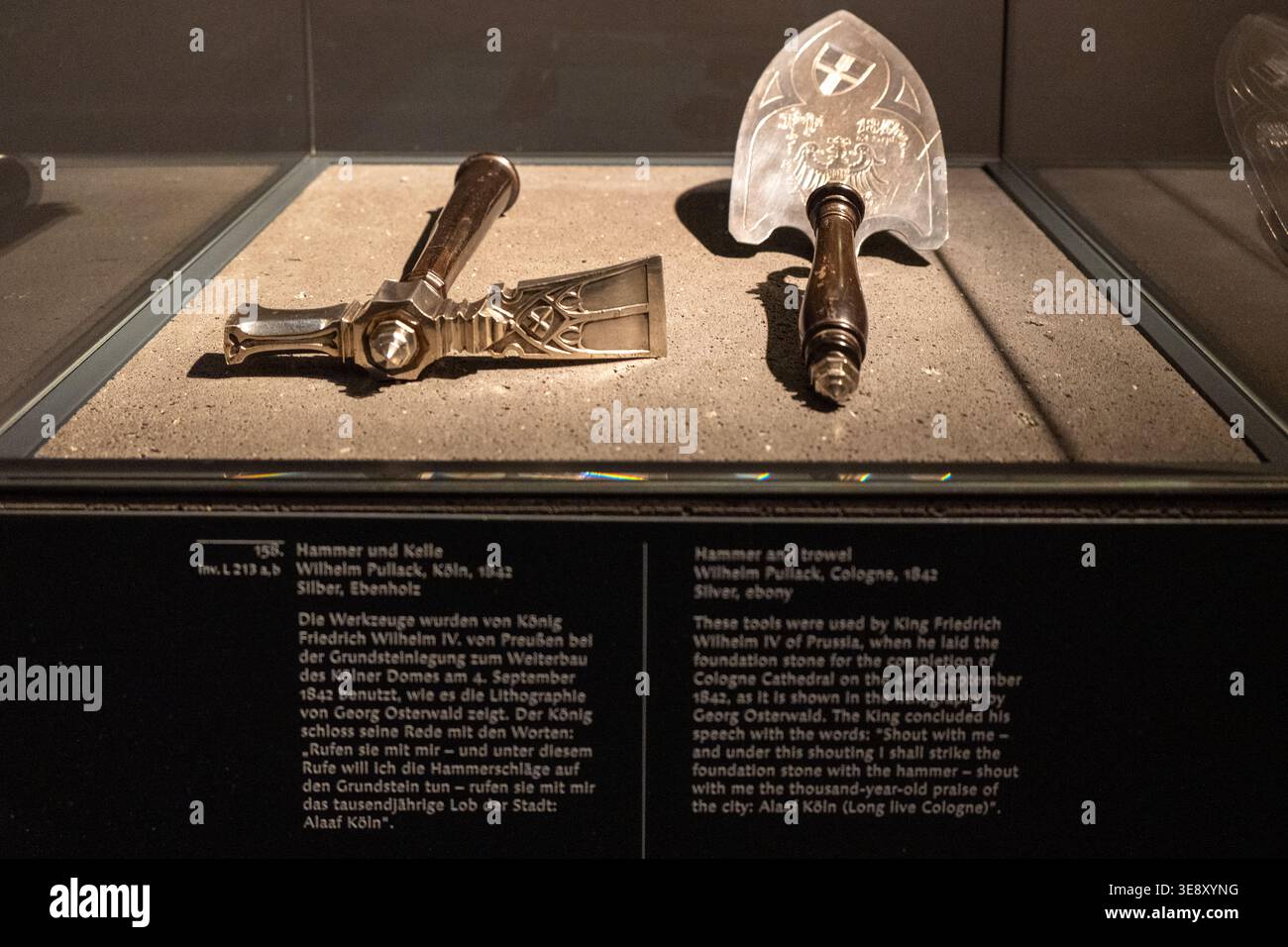 Displayed Cologne, Germany - 19 May 24: Ceremonial hammer and trowel used for a ...