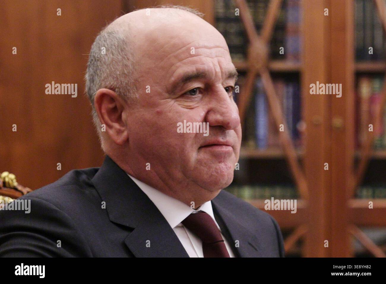 Rashid Temrezov, the Head of the Karachay-Cherkess Republic, listens to ...