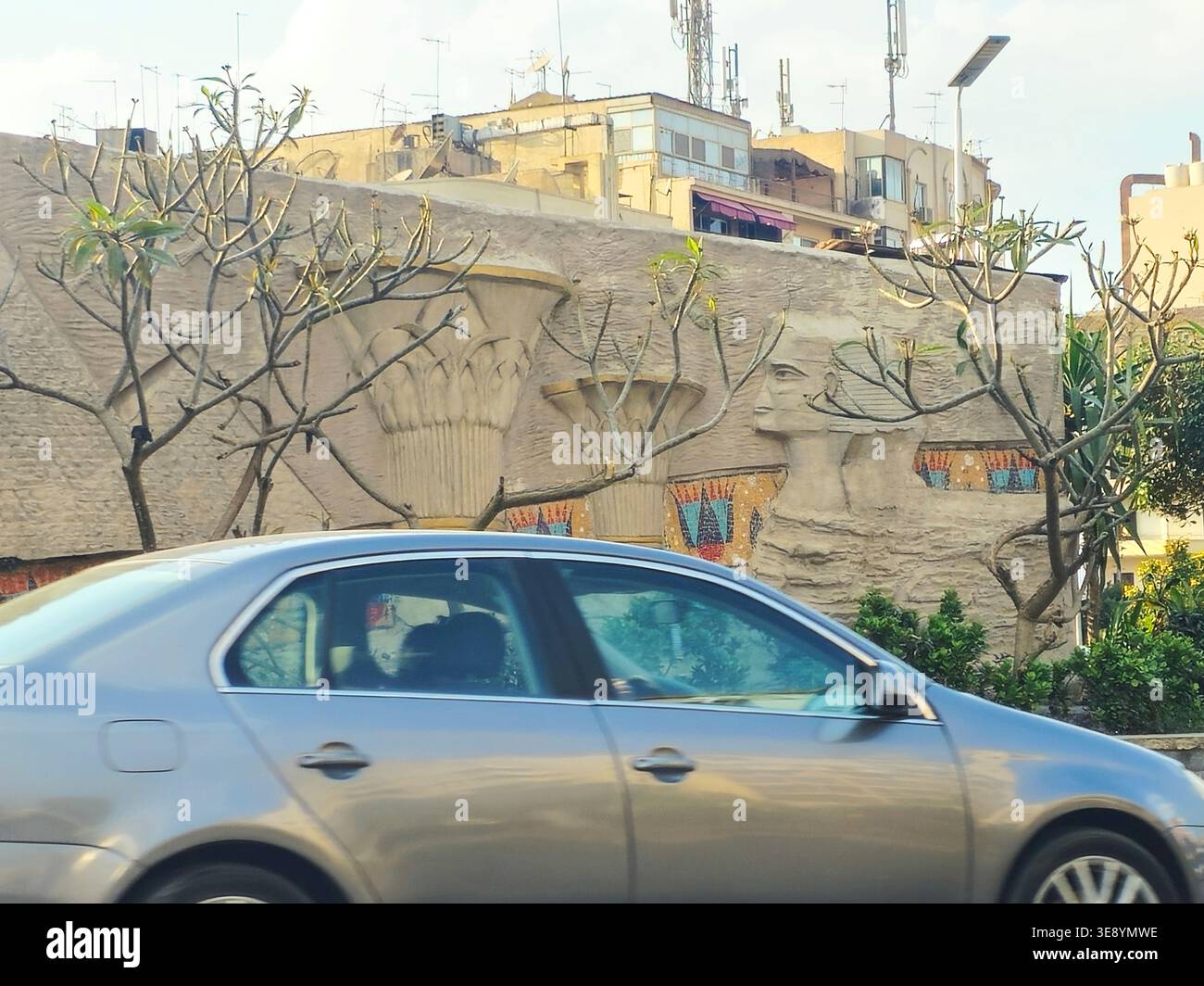 Cairo, Egypt, March 24 2026: a stylized wall relief depicting elements ...