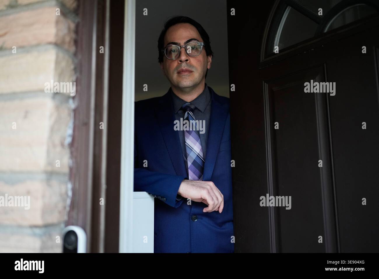 Ali Atock Ali Tarokh poses for a photo at his home in Chicago, Wednesday, March ...