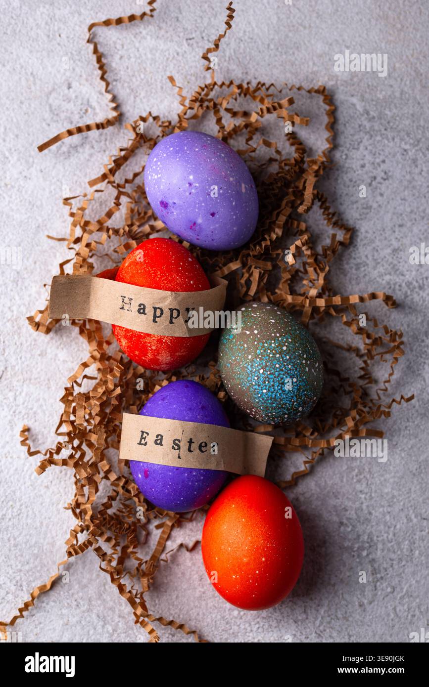 Easter eggs painted in purple and red Stock Photo