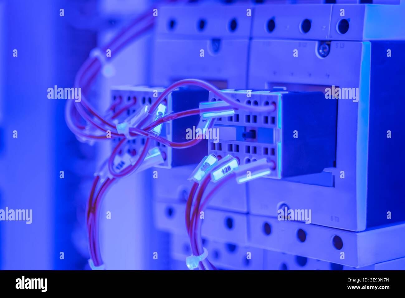 Contactor for switching electrical power circuit with blue illumination Stock Photo