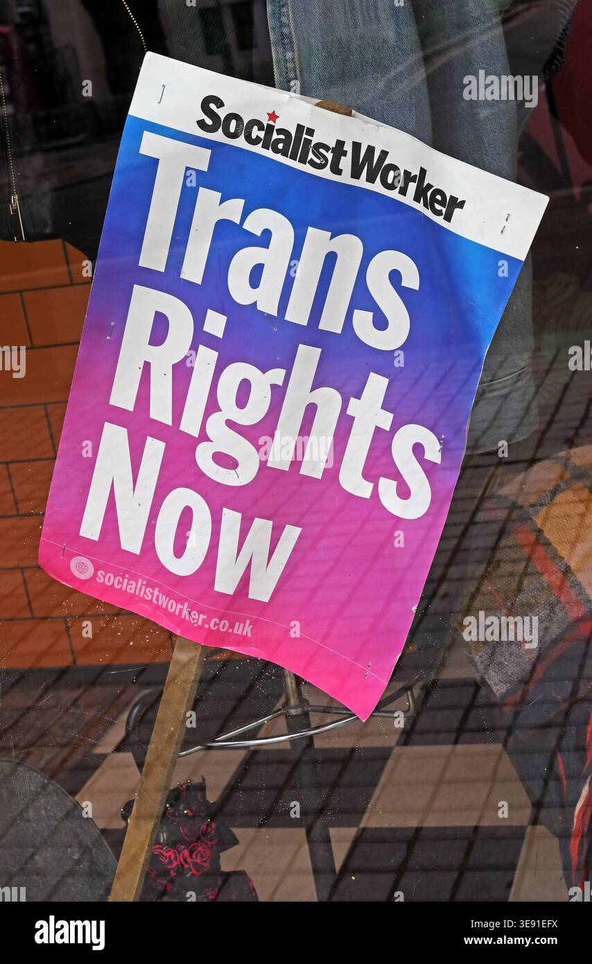 Socialist Worker ‘Trans Rights Now’ placard at a protest in Liverpool, England, UK Stock Photo