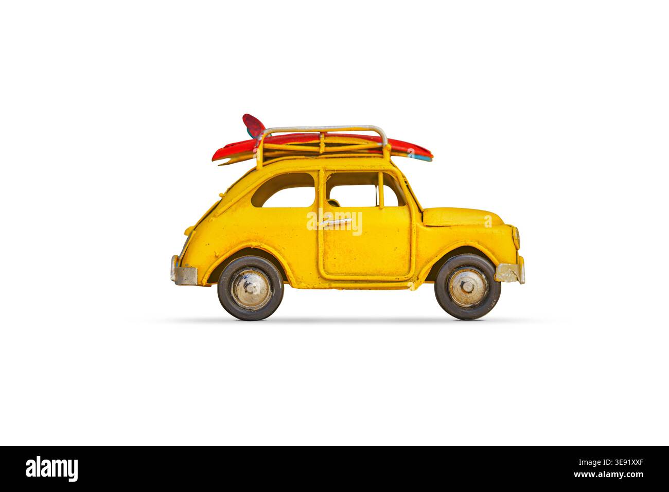 retro car with baggage, luggage and beach equipment on the roof, fully packed, ready for summer vacation Stock Photo