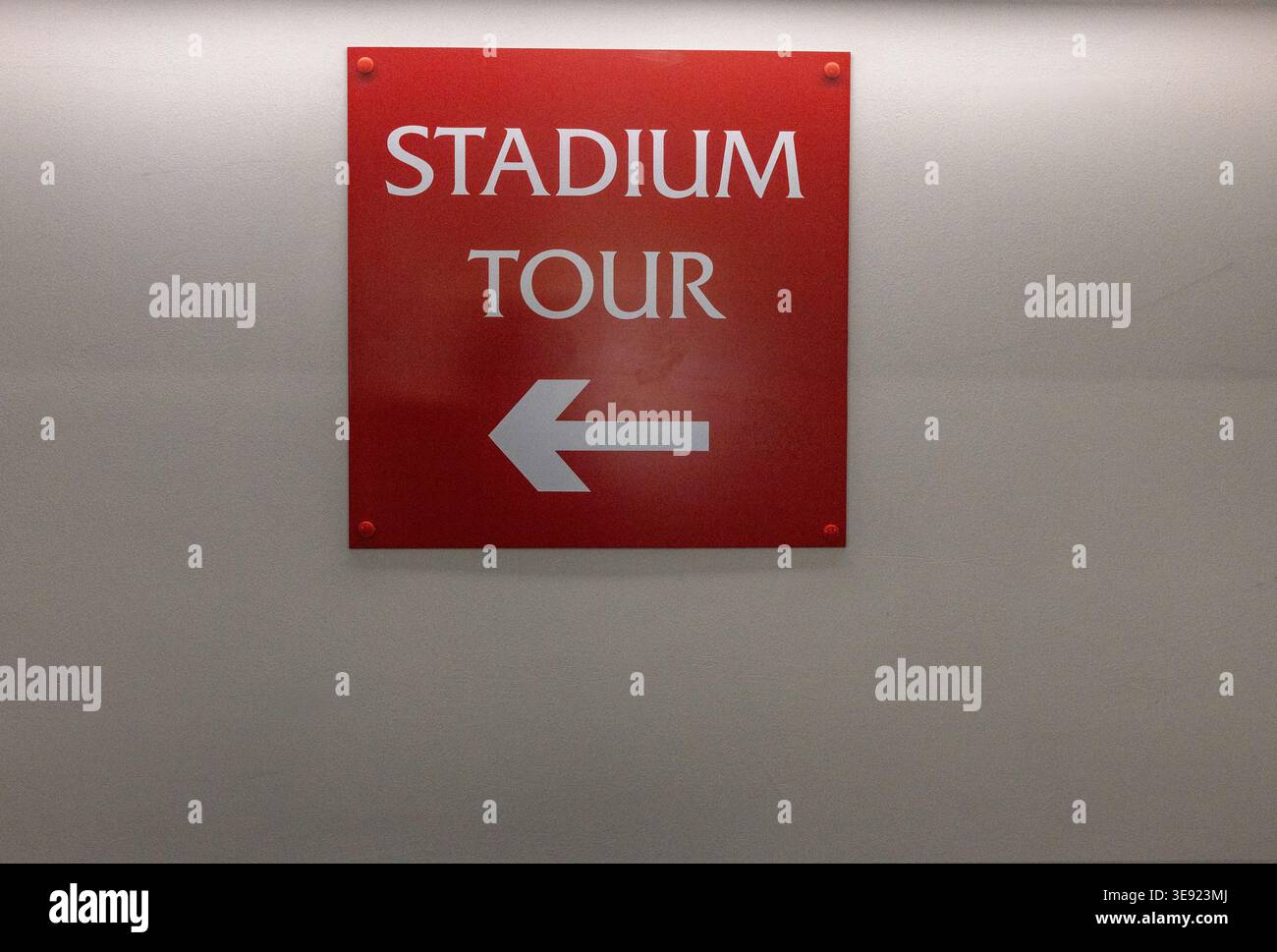 Red directional sign for the 