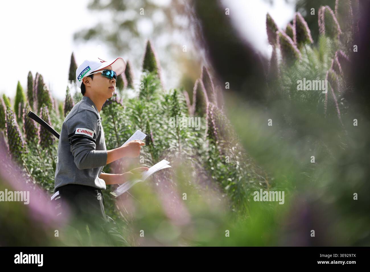 Hyo Joo Kim walks on a pathway to the third tee during the first round ...