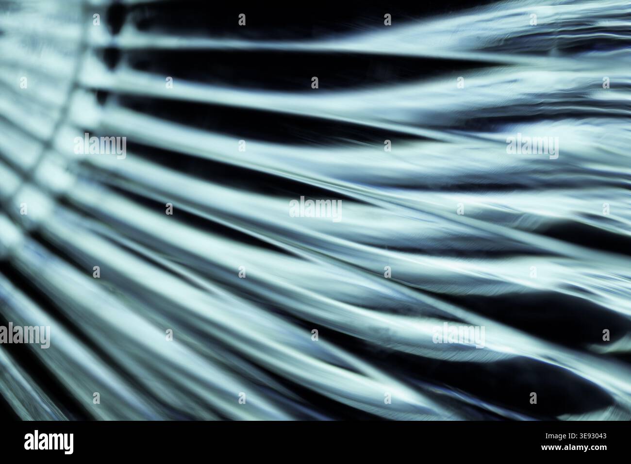Diagonal abstract silver metallic lines with sleek motion blur effect Stock Photo