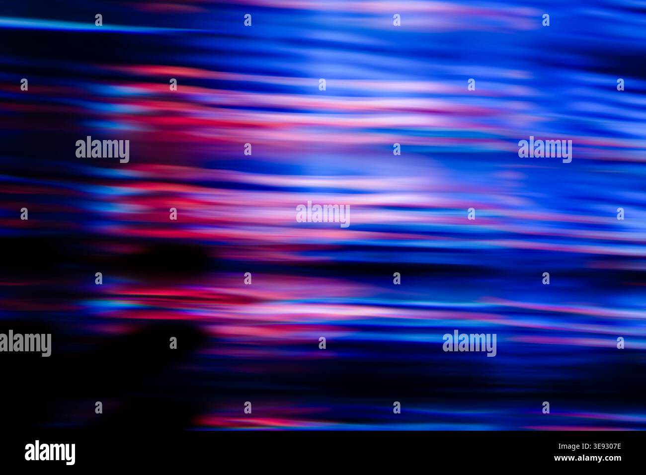 Horizontal fast motion blur pattern with intense blue and neon pink light reflections Stock Photo