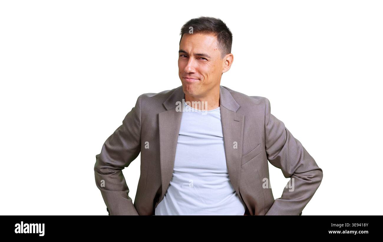 Confident man smirking and looking at camera Stock Photo