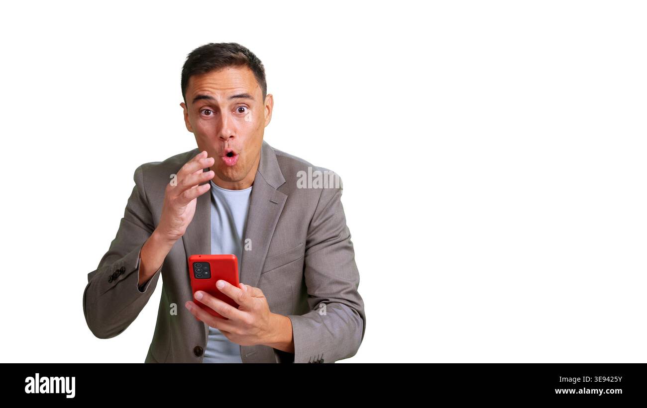 Surprised man looking at smartphone with transparent background Stock Photo