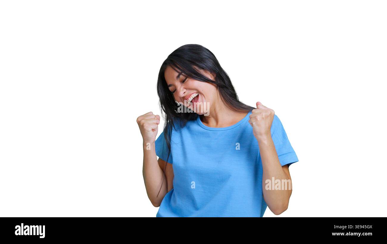 Happy woman celebrating success joyfully with fists pump Stock Photo