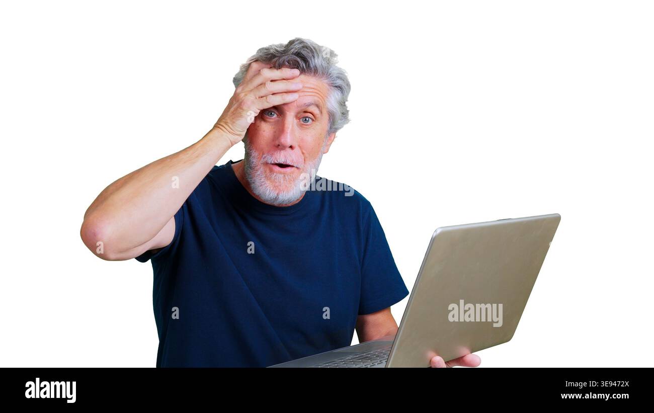 Senior man realizing a mistake while using laptop Stock Photo