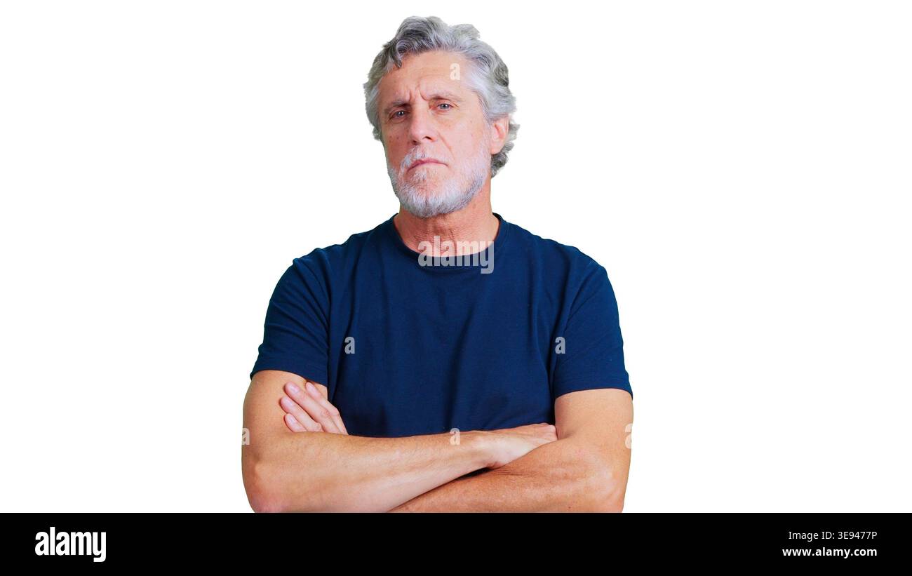 Mature man with serious expression crossing arms Stock Photo