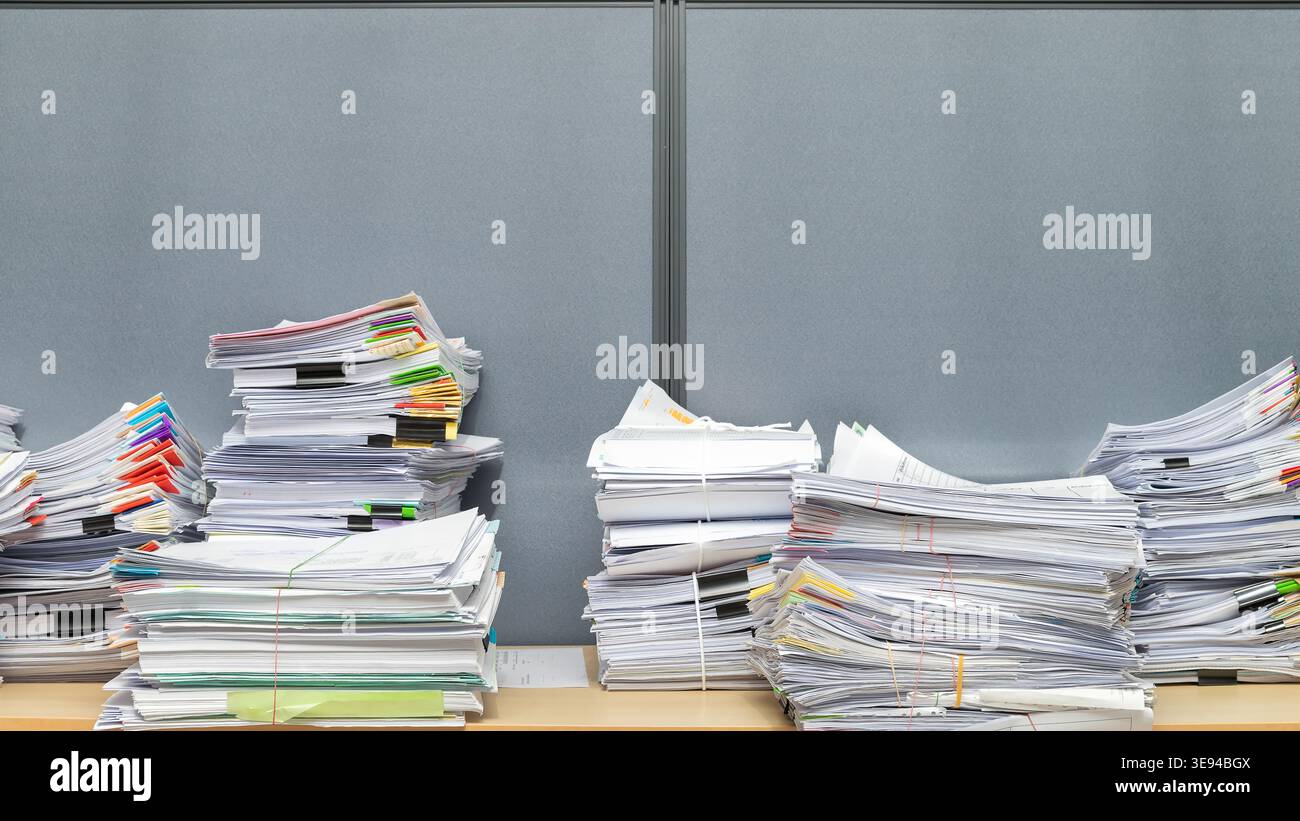 Business documents stack on table, report papers stack. Stock Photo