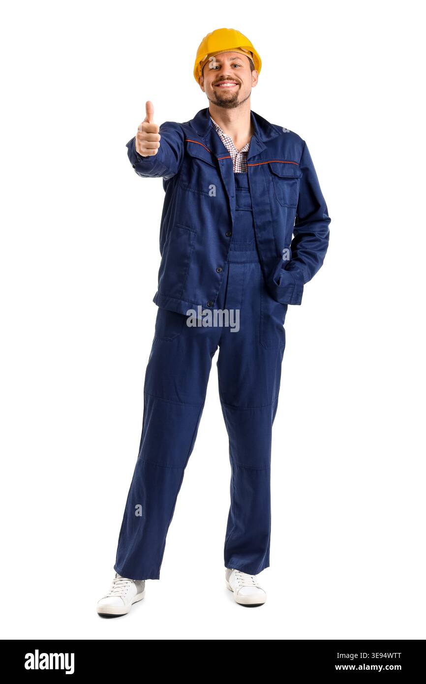 Male builder showing thumb-up on white background Stock Photo