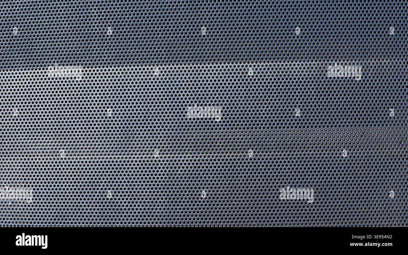 metal texture perforated sheet metal background Stock Photo