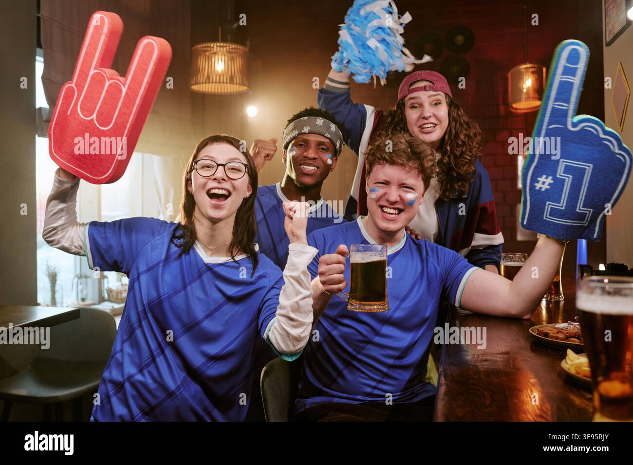 Teenager friends cheering victory hi-res stock photography and images ...