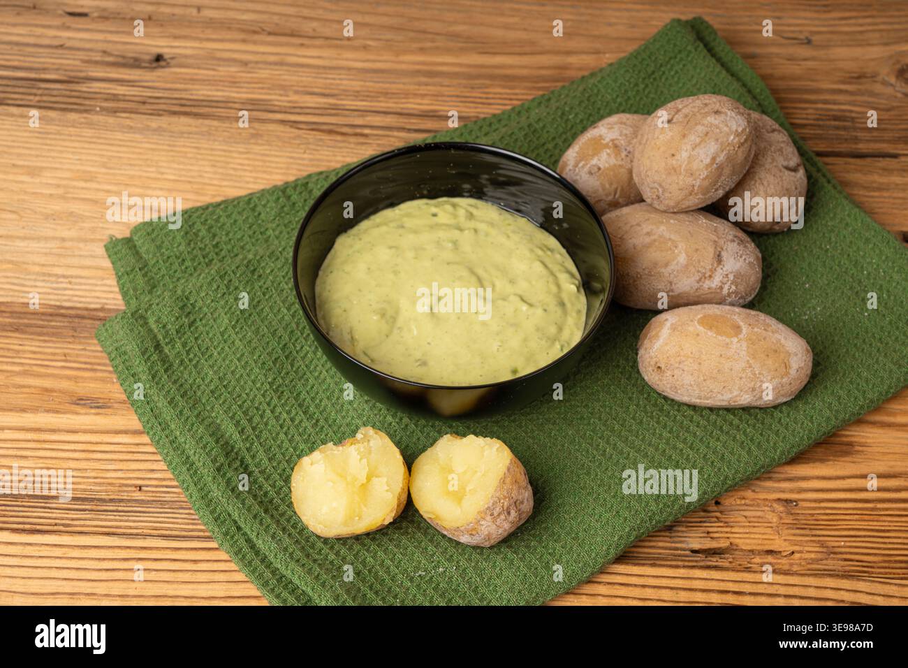 Red mojo rojo and green mojo verde sauces, traditional Tenerife dips, mojo picon dressing, Canary Islands Papas arrugadas sea water boiled potatoes, S Stock Photo