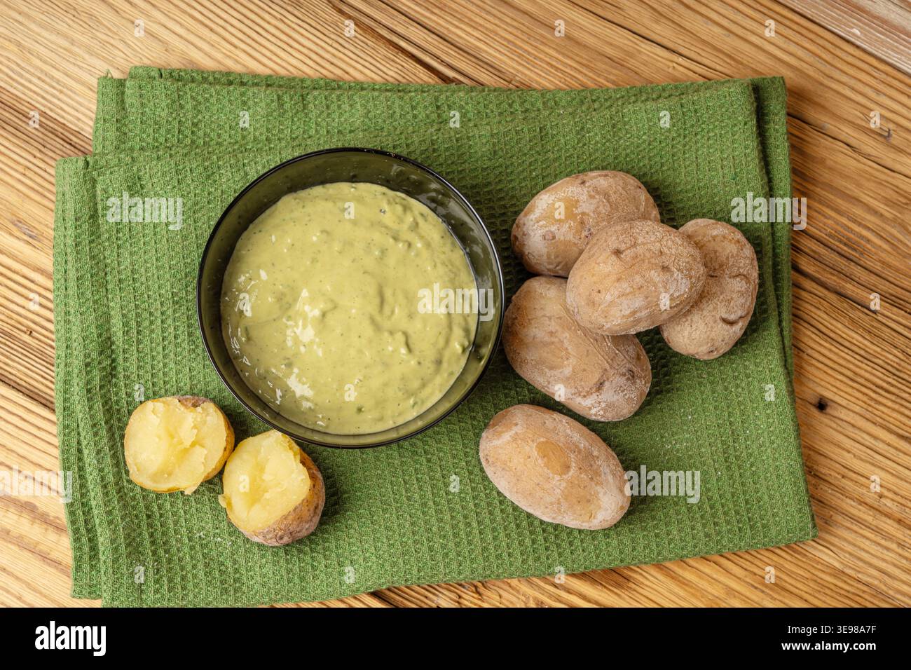Red mojo rojo and green mojo verde sauces, traditional Tenerife dips, mojo picon dressing, Canary Islands Papas arrugadas sea water boiled potatoes, S Stock Photo