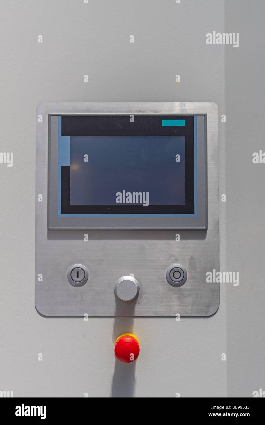 Big Touch Screen Machine Control With Emergency Stop Button Stock Photo