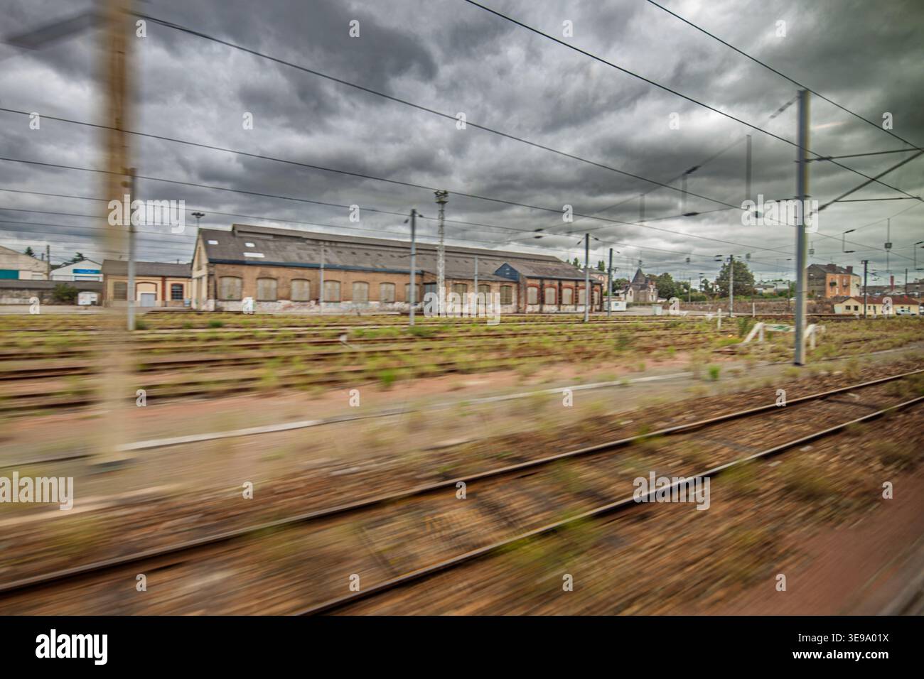 Tgv Window The view from a TGV high-speed train window shows multiple railway ...