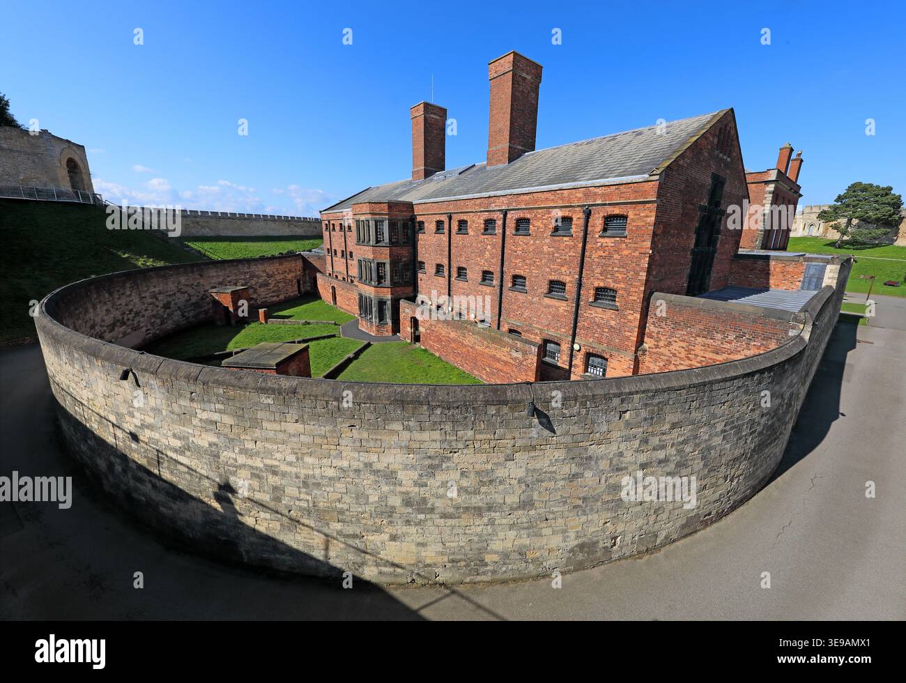 Lincoln Castle Victorian Prison, red brick cell block and exercise yards inside the medieval castle walls. Stock Photo