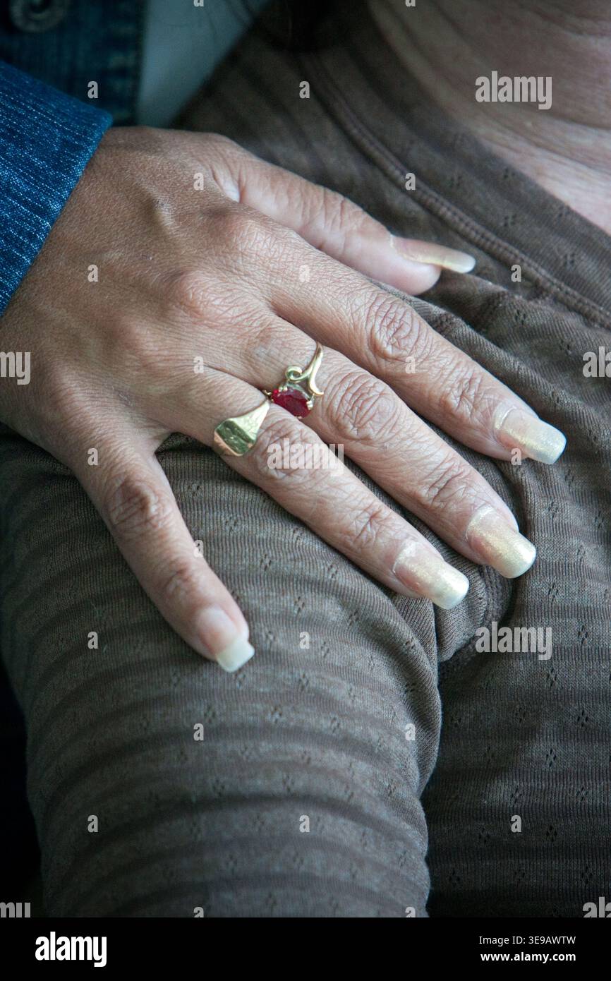Cuba, Cienfuegos.  Long Fingernails Designate a Professional Woman, i.e., one who does not dirty her hands while working. Stock Photo