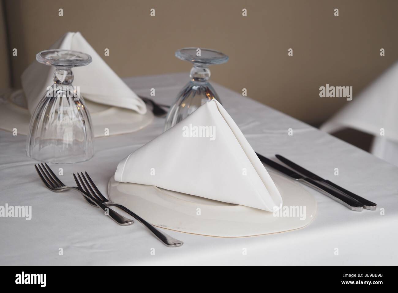 Table set for dining in a restaurant Stock Photo