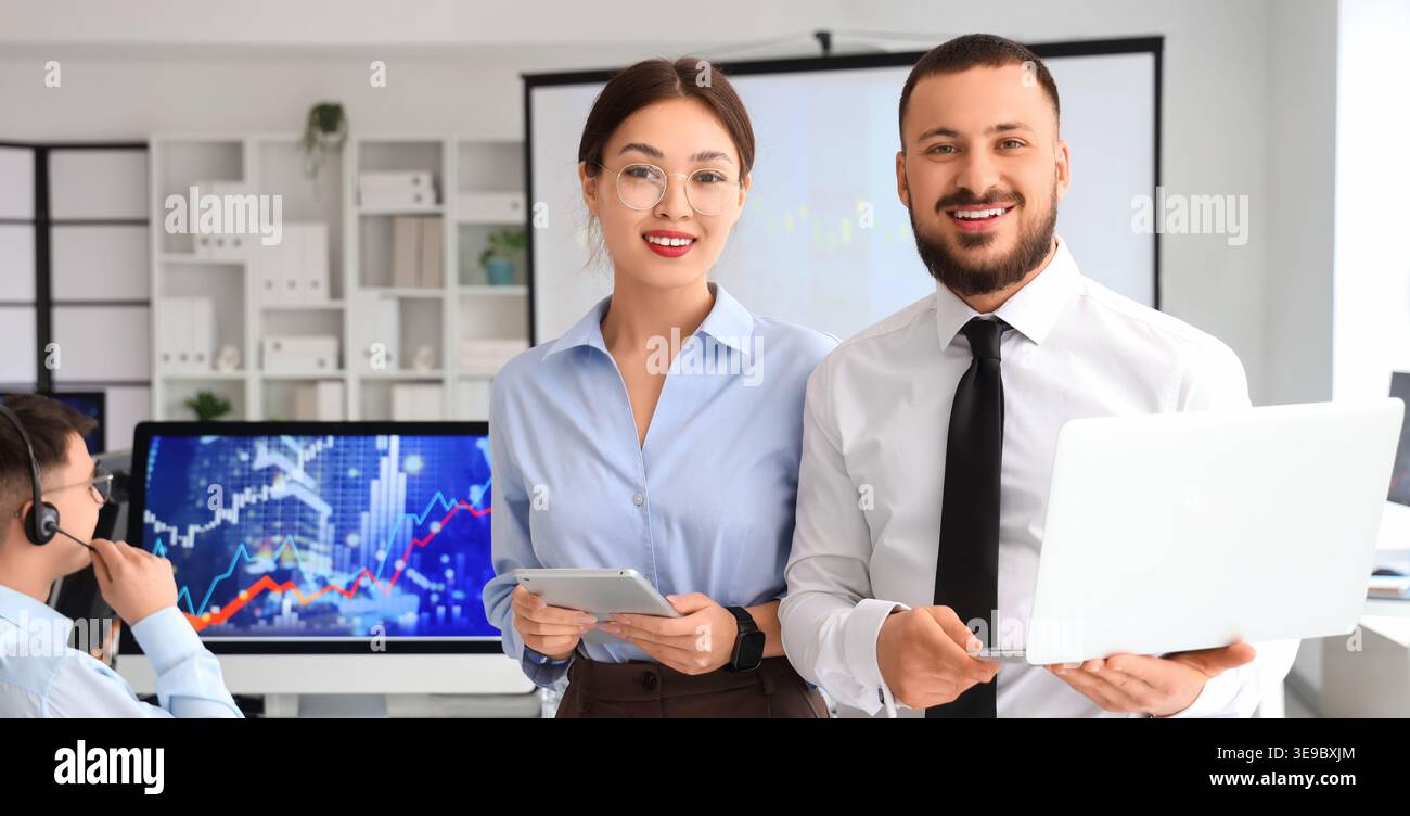 Young business analysts in office Stock Photo