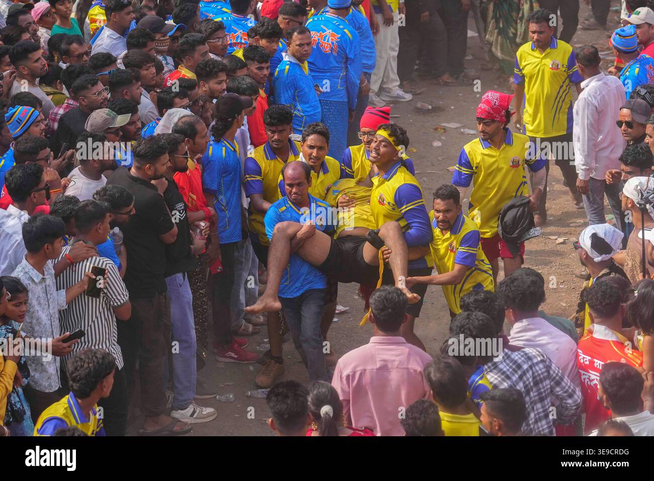 Rayba Devi Rave Volunteers carry an injured participant who was hurt while competing in ...