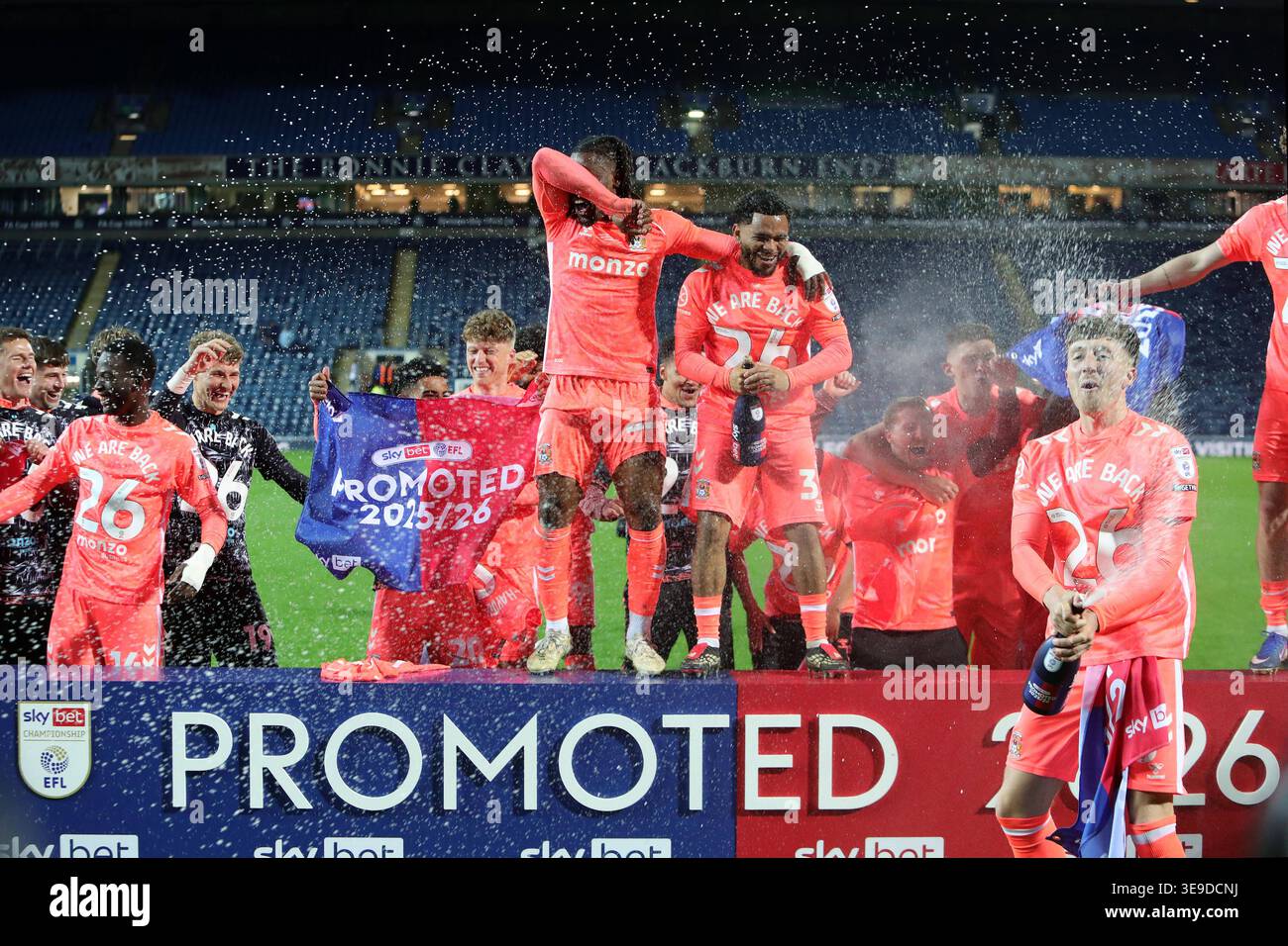 Coventry City players celebrate promotion following the Blackburn ...