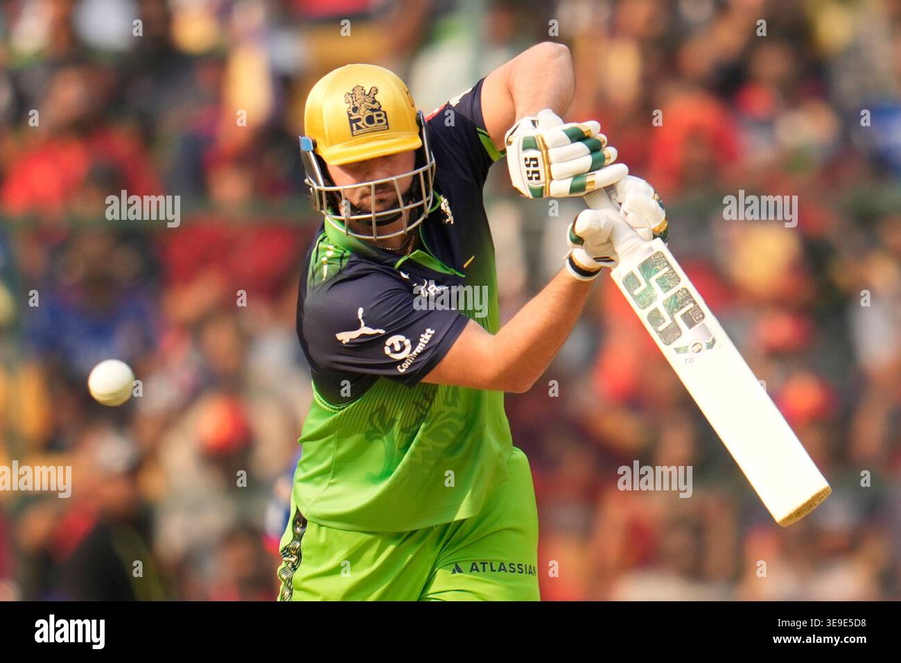 Royal Challengers Bengaluru's Tim David plays a shot during the Indian ...
