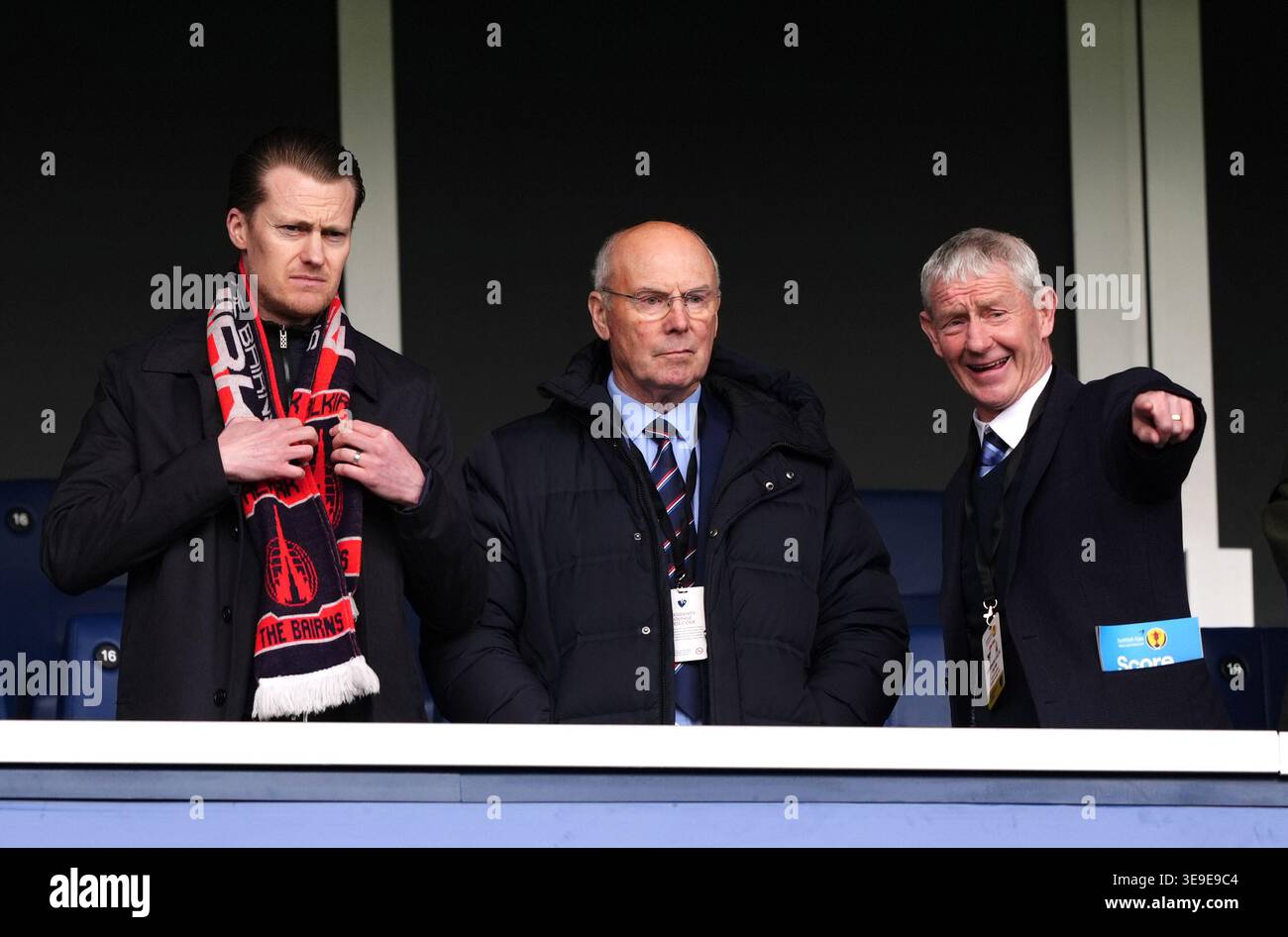 Alex Totten (centre) and Kevin McAllister (right) in the stands ahead ...