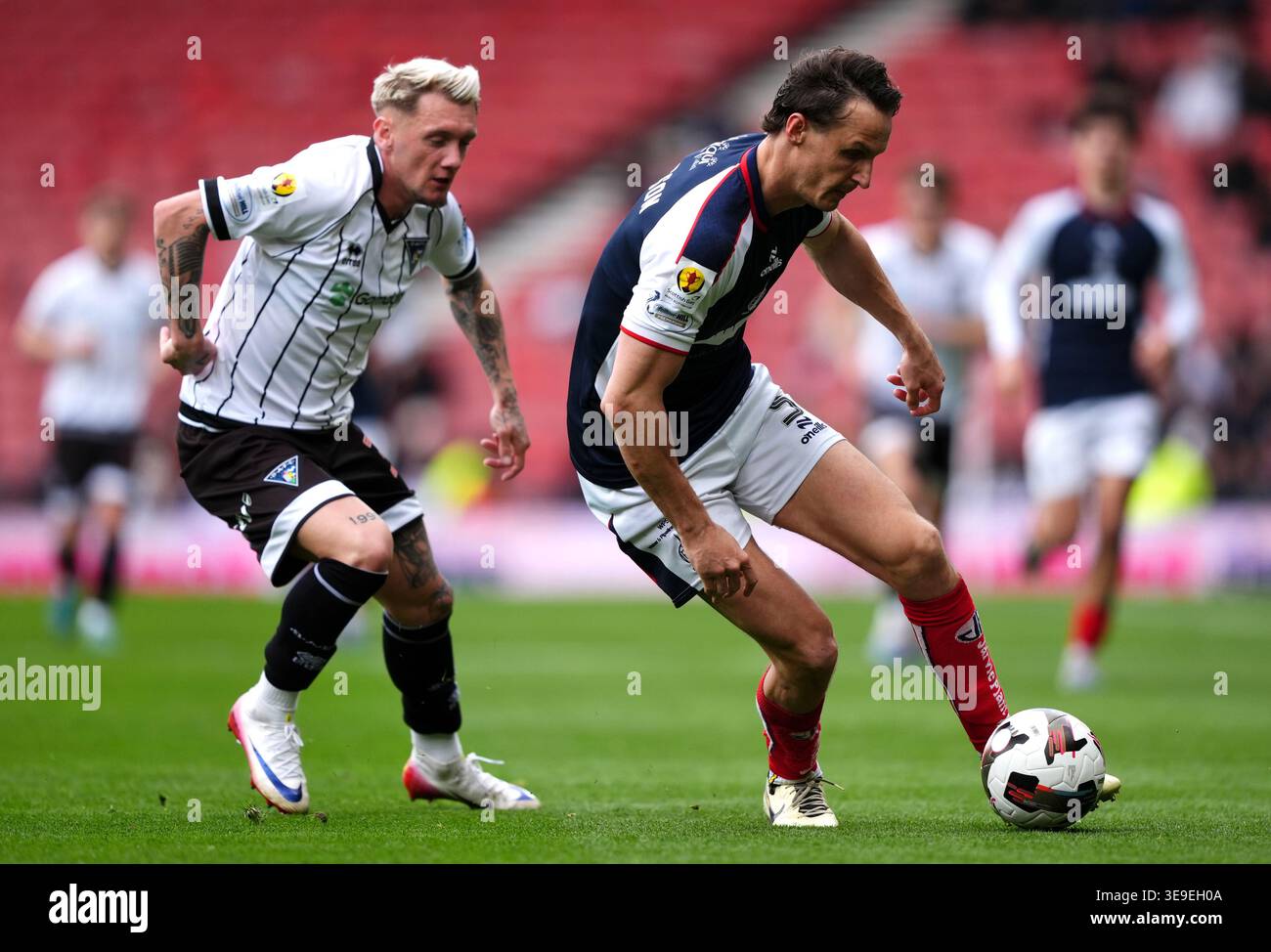 Dunfermline Athletic's Callum Morrison (left) and Falkirk's Liam ...