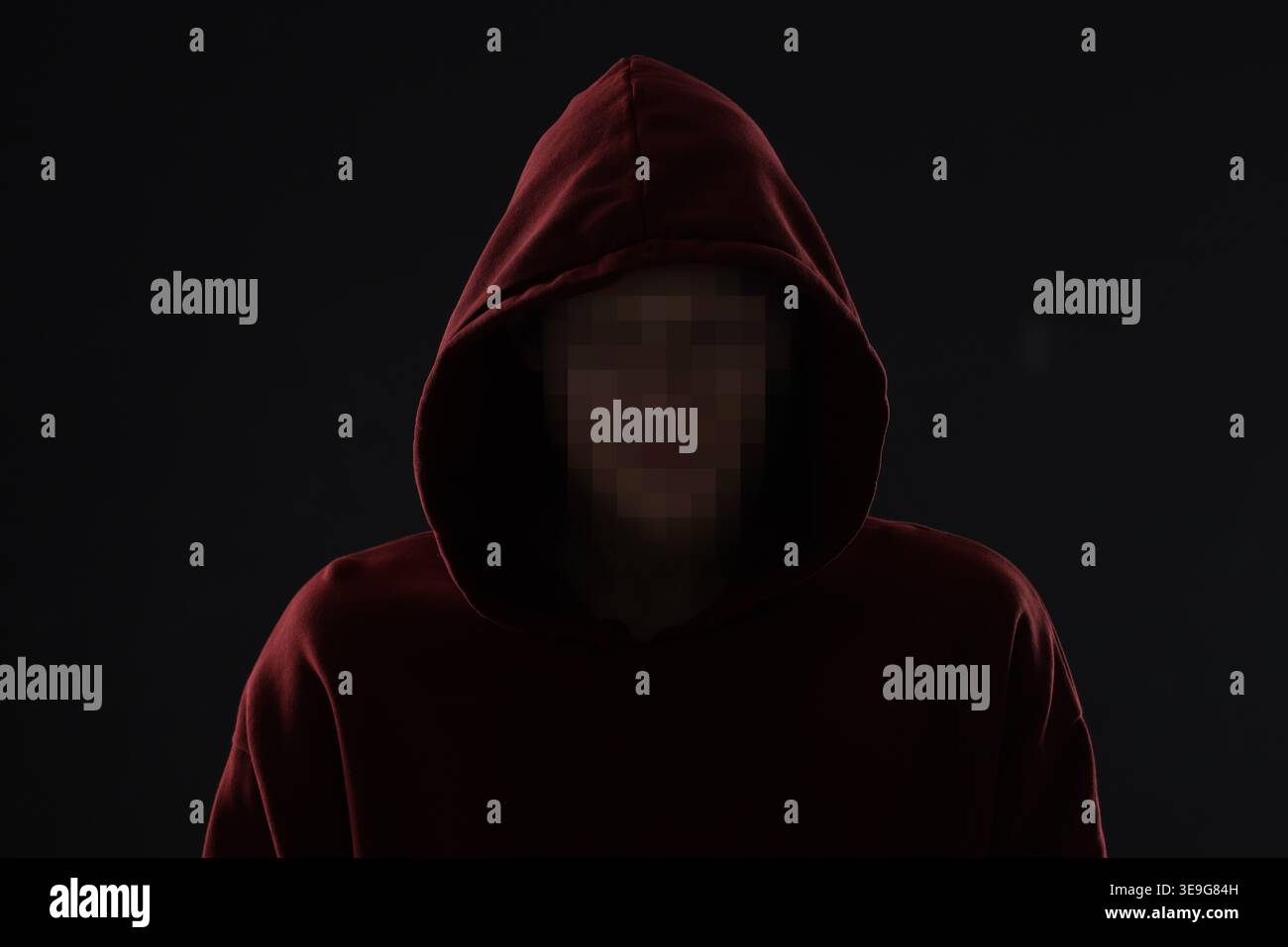 Anonymous man with pixelated face on black background Stock Photo