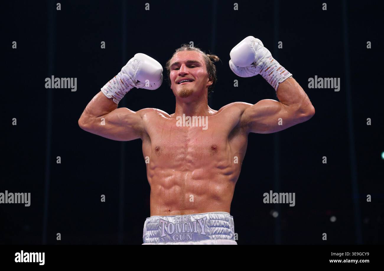 Fr. Tom Rafferty Tom Rafferty celebrates winning against Pablo Sosa Sosa at the M&S Bank ...