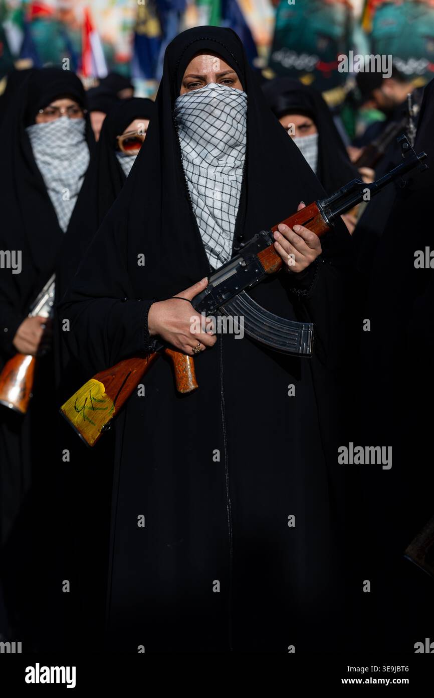 A woman member of the Basij paramilitary, affiliated with Iran's ...